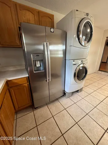 a close view of a refrigerator and washer