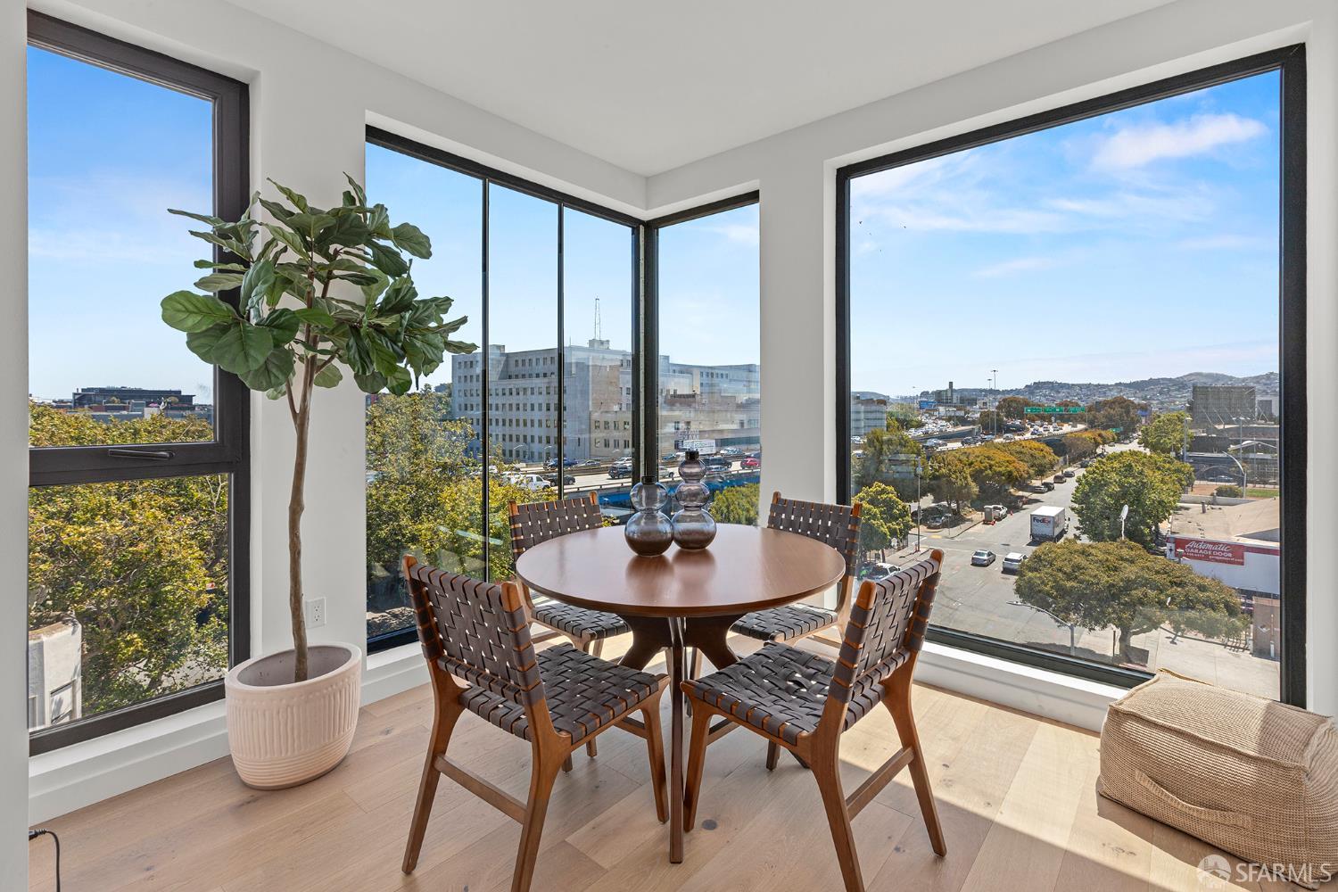 988 Harrison Street, Unit HM6 San Francisco, CA 94107 - Photo 5 of 14 a dining room with furniture window and outside view