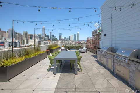 a view of a balcony with chairs