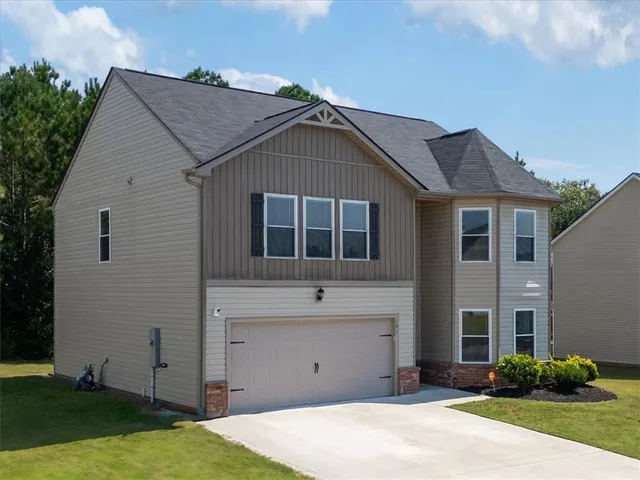 a house view with a garden space