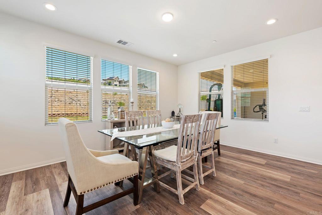 22089 Gallop Way Escondido, CA 92029 - Photo 15 of 43 a view of a dining room with furniture window and outside view