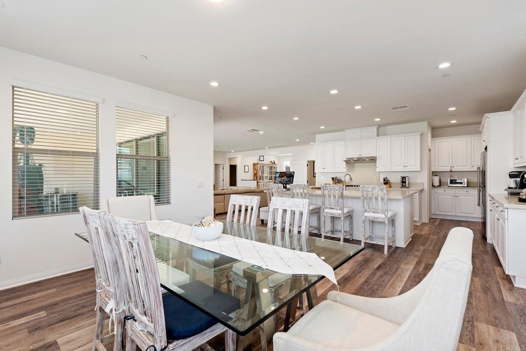 22089 Gallop Way Escondido, CA 92029 - Photo 16 of 43 a view of a dining room with furniture