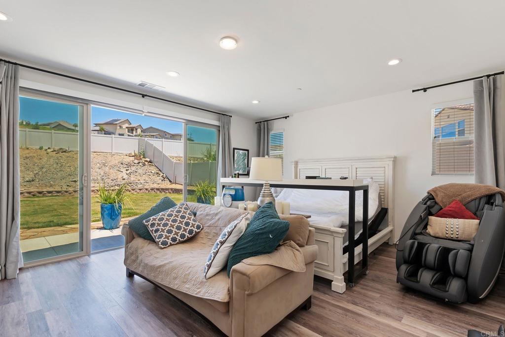 22089 Gallop Way Escondido, CA 92029 - Photo 17 of 43 a living room with furniture and a large window
