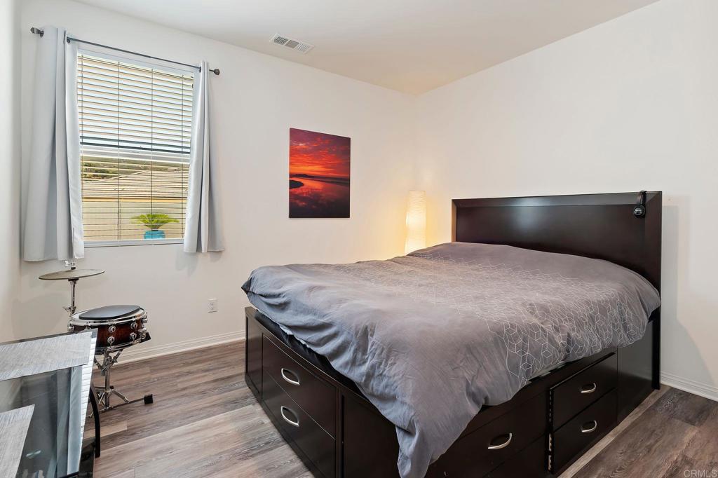 22089 Gallop Way Escondido, CA 92029 - Photo 21 of 43 a bedroom with a bed and a window