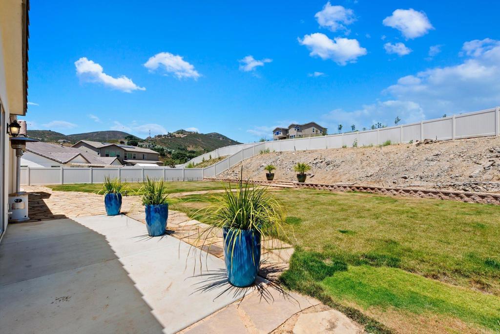 22089 Gallop Way Escondido, CA 92029 - Photo 32 of 43 a view of a terrace with lawn chairs