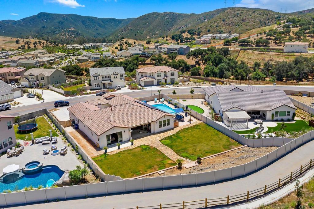 22089 Gallop Way Escondido, CA 92029 - Photo 40 of 43 an aerial view of residential houses and outdoor space