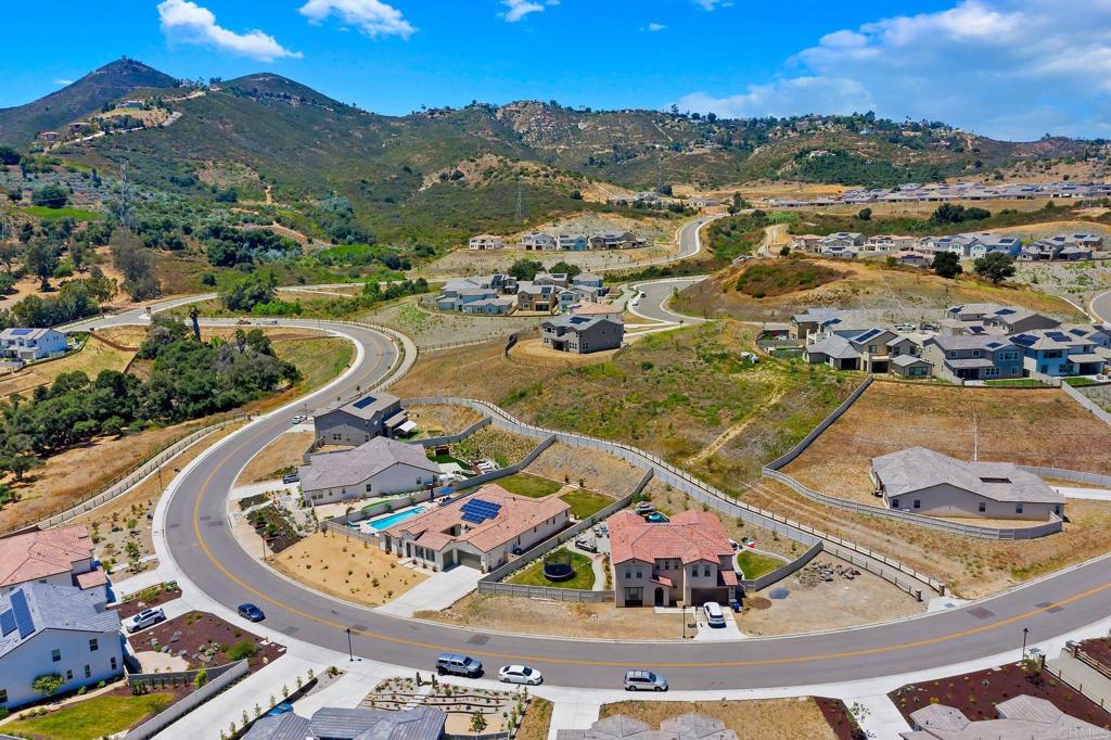 22089 Gallop Way Escondido, CA 92029 - Photo 42 of 43 an aerial view of a house with a ocean view