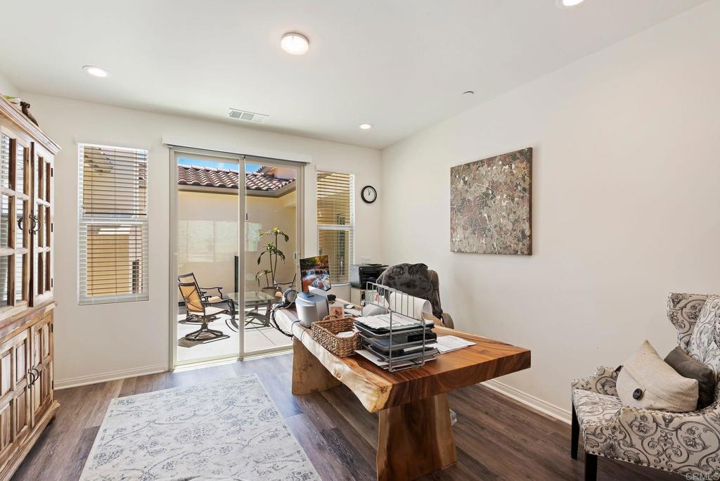 22089 Gallop Way Escondido, CA 92029 - Photo 9 of 43 a living room with furniture and a table