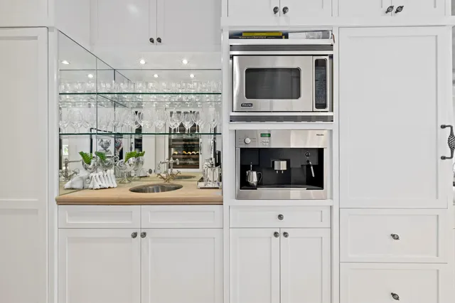 a kitchen with a stove and a microwave