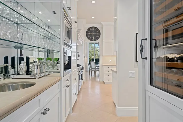 a bathroom with a sink a mirror and shower