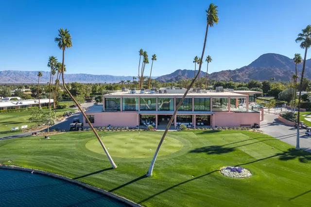 a view of a patio with swimming pool