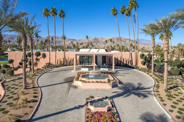 a view of a city with mountains in the background