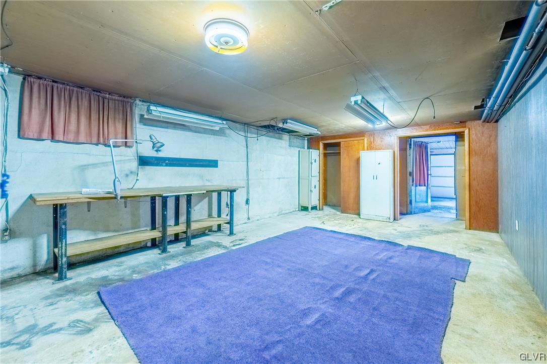 6991 Hilltop Road Allentown, PA 18106 - Photo 14 of 26 wooden floor in an empty room with a window