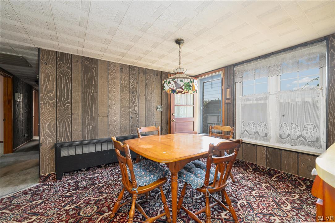 6991 Hilltop Road Allentown, PA 18106 - Photo 5 of 26 a view of a dining room with furniture window and wooden floor