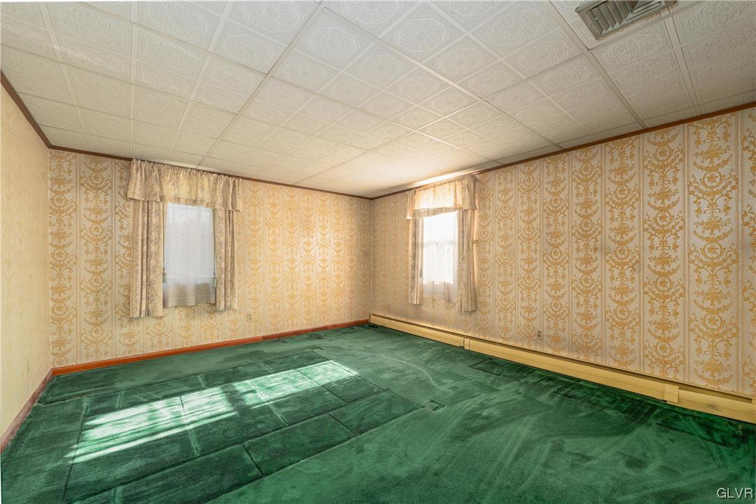 6991 Hilltop Road Allentown, PA 18106 - Photo 10 of 26 a view of an empty room with a window