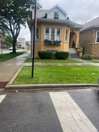 a front view of house with yard