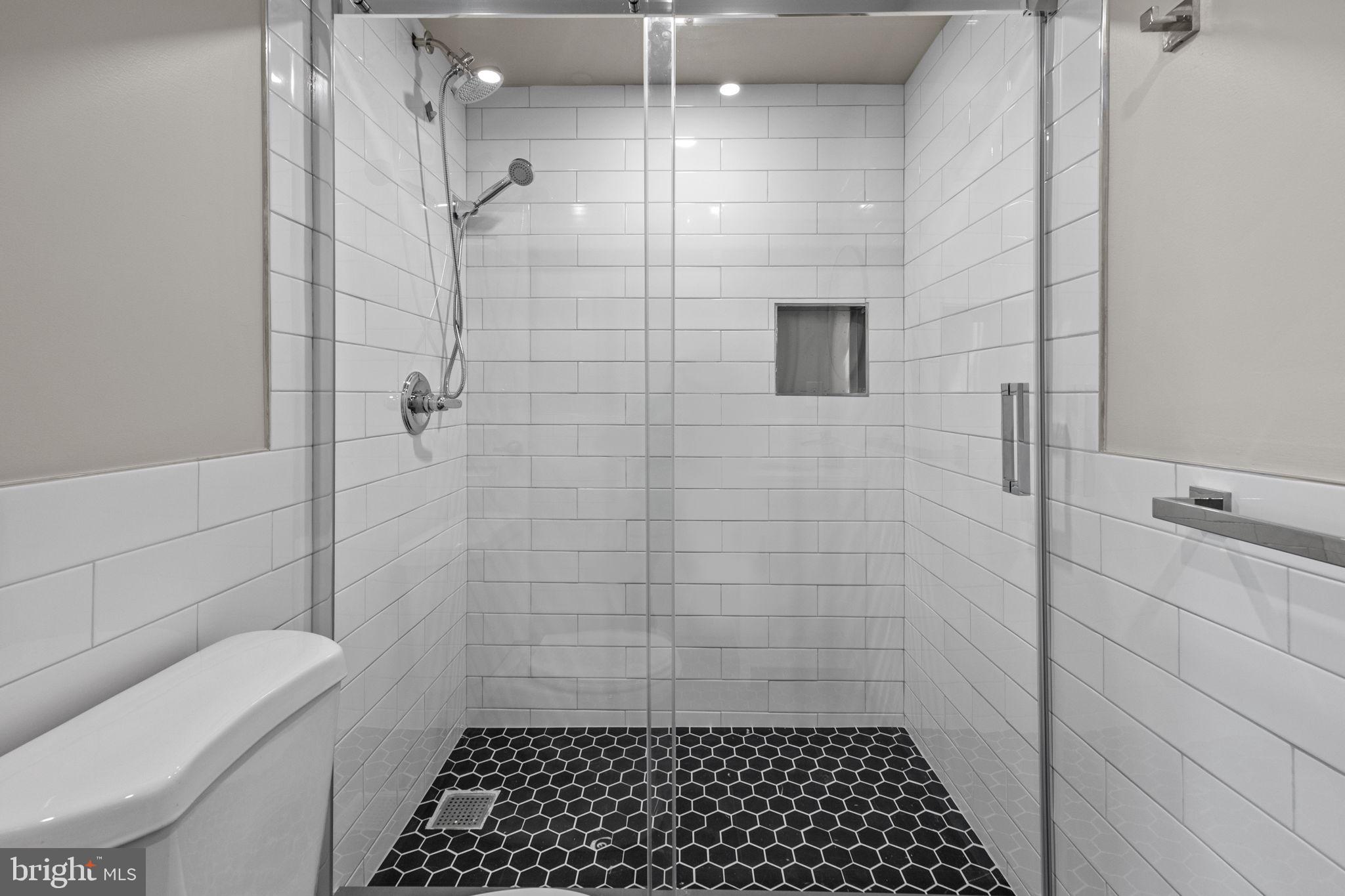 77 East Pastorius Street, Unit 1 Philadelphia, PA 19144 - Photo 41 of 43 a bathroom with a sink and toilet