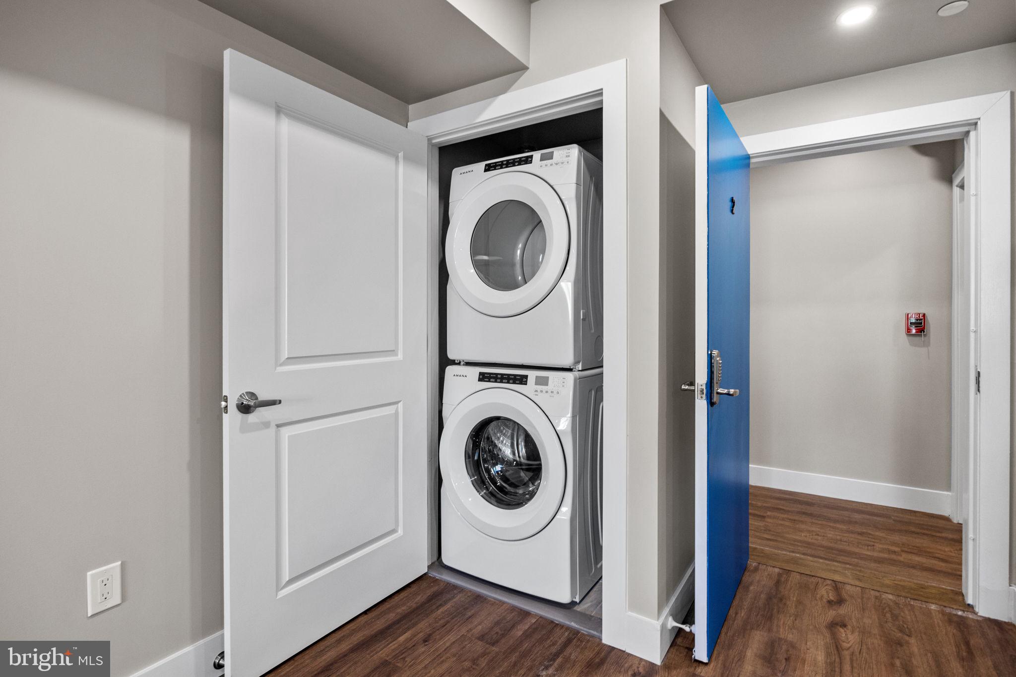77 East Pastorius Street, Unit 1 Philadelphia, PA 19144 - Photo 42 of 43 a utility room with sink dryer and washer