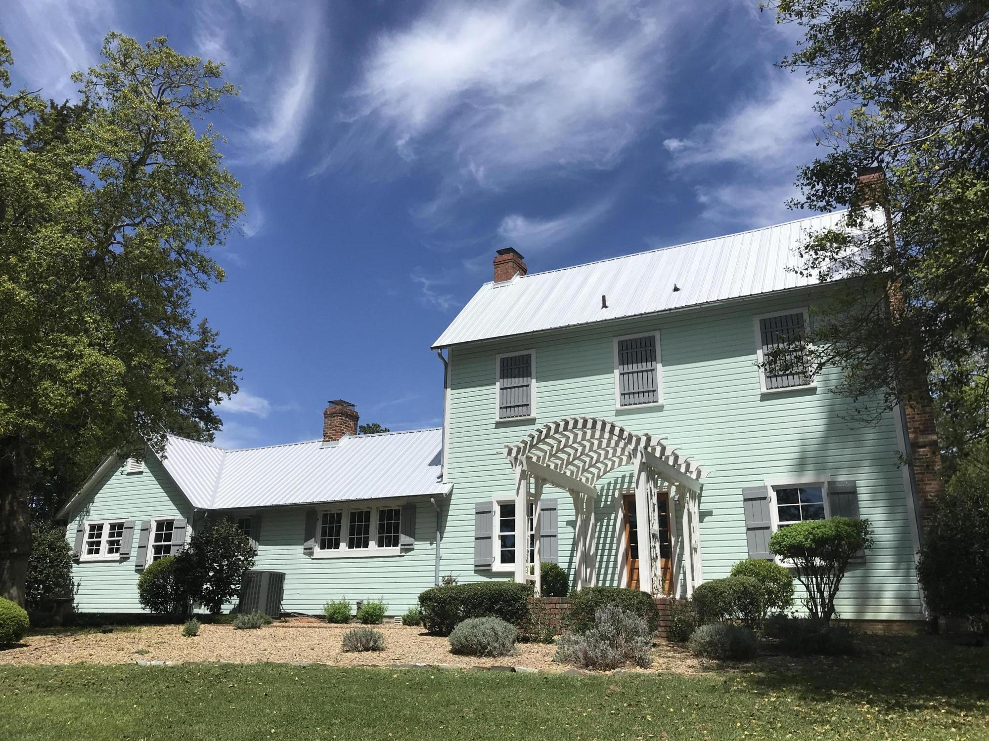 389 Old Mail Road Southern Pines, NC 28387 - Photo 2 of 54 This lovely home is featuring new metal roofs on main house, guest house and barns
