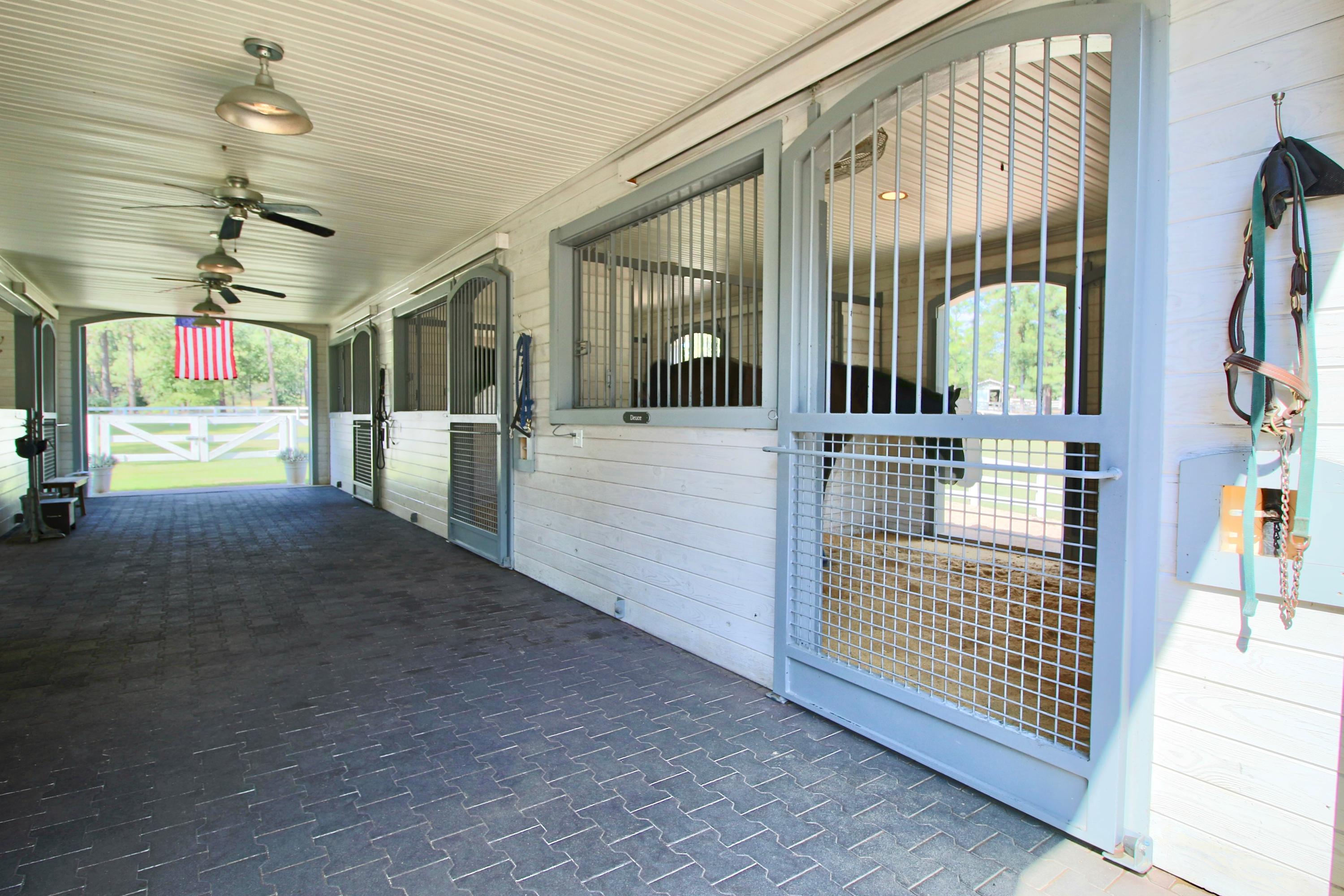 389 Old Mail Road Southern Pines, NC 28387 - Photo 31 of 54 Interior of Barn with four 14 x 12 stalls