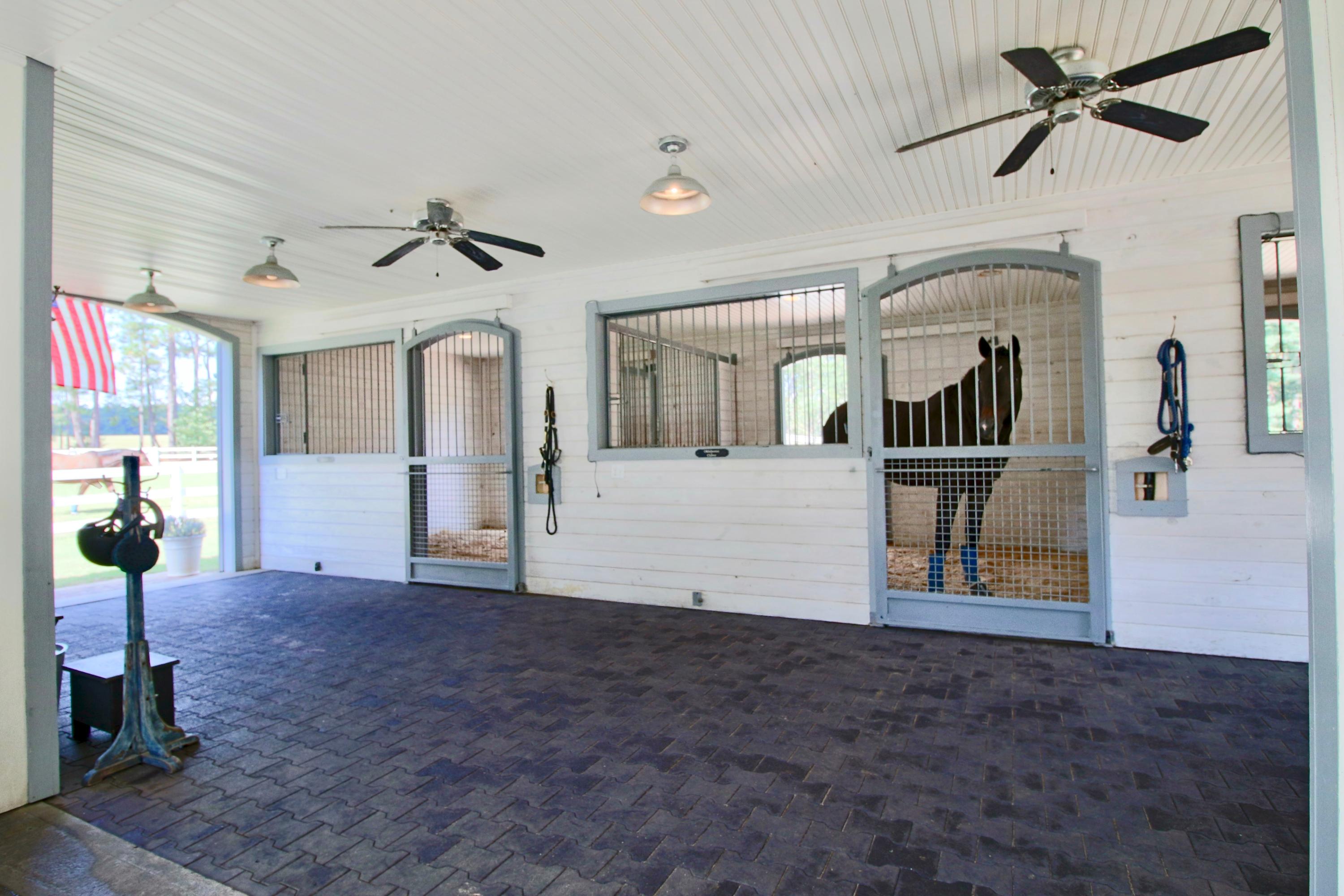 389 Old Mail Road Southern Pines, NC 28387 - Photo 33 of 54 Barn Aisle