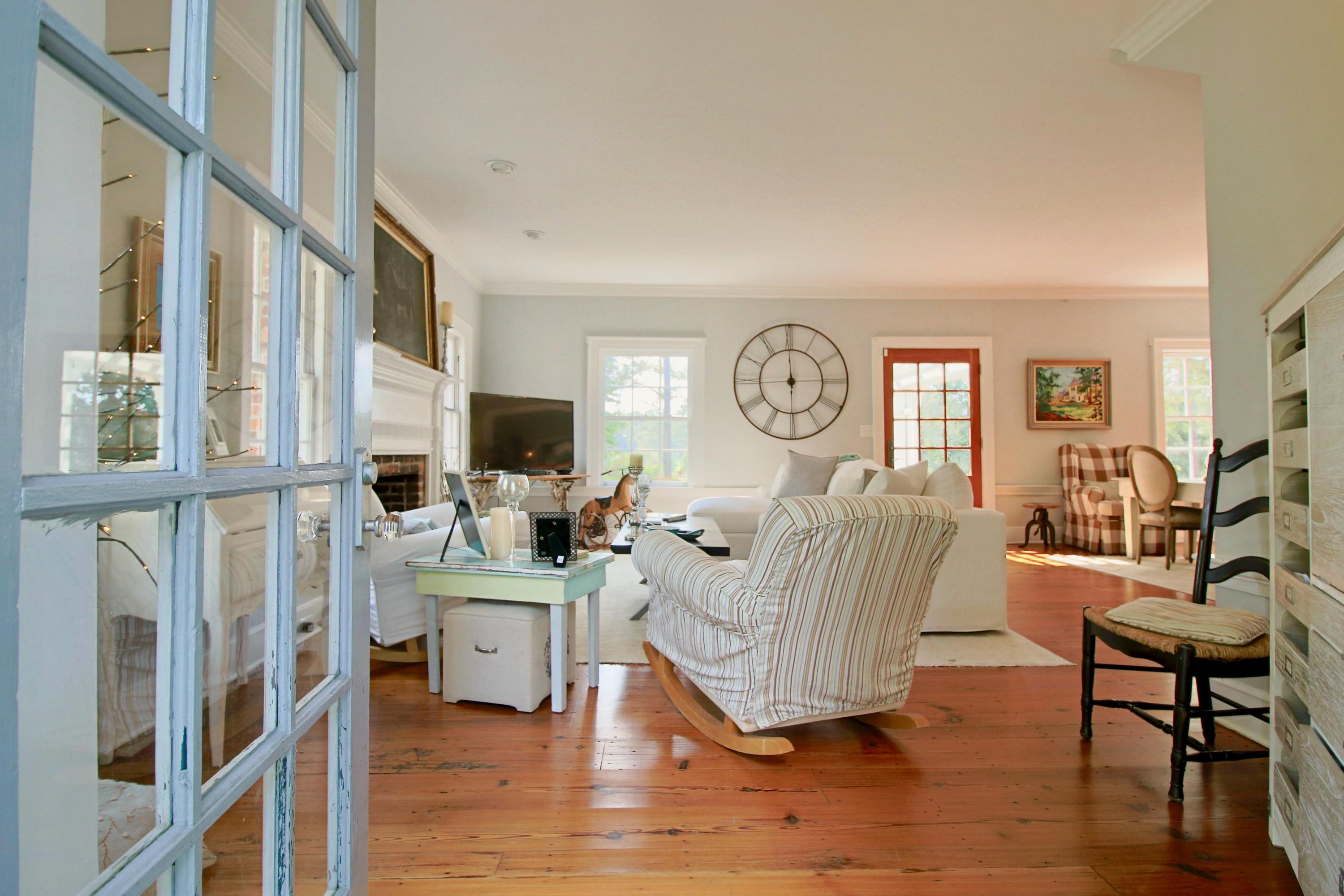 389 Old Mail Road Southern Pines, NC 28387 - Photo 6 of 54 Living room with 10 foot ceilings. Rare pumpkin pine floors.