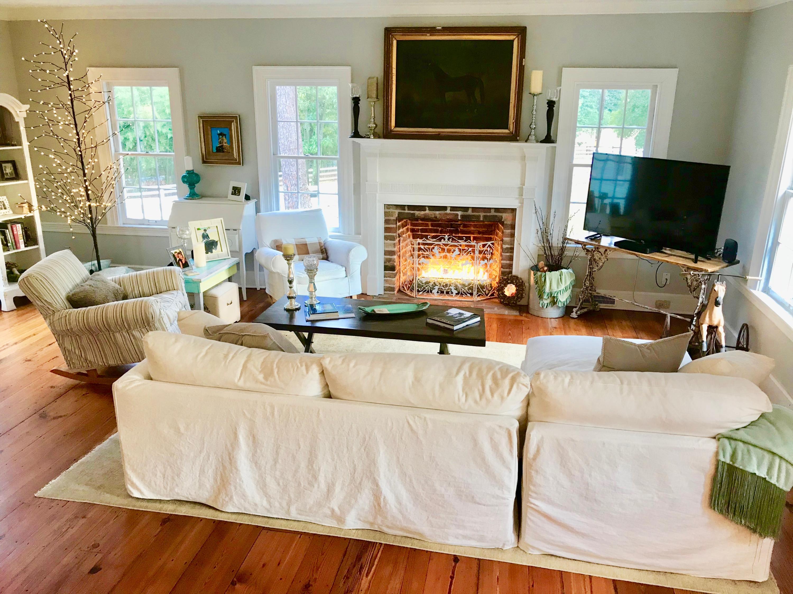 389 Old Mail Road Southern Pines, NC 28387 - Photo 7 of 54 Living room with one of 4 fireplaces. Gas logs in this fireplace.