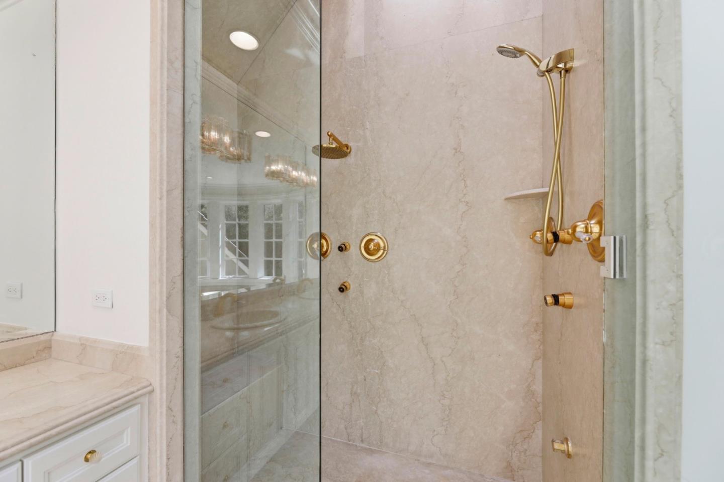 14113 Pike Road Saratoga, CA 95070 - Photo 43 of 78 a bathroom with a shower and a sink
