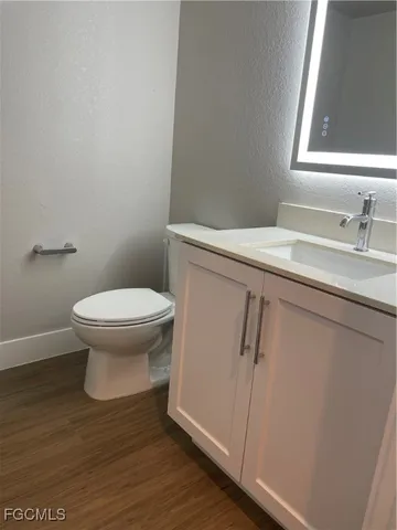 a bathroom with a sink and a toilet