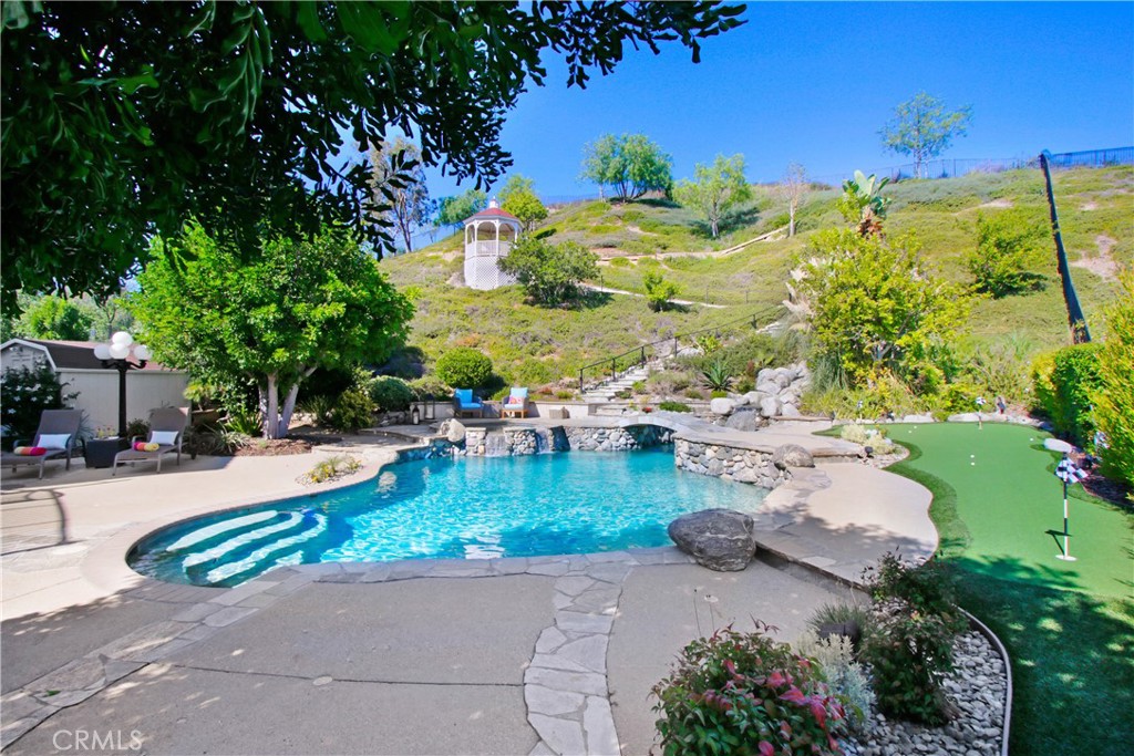 12036 Wood Ranch Road Granada Hills, CA 91344 - Photo 3 of 55 Pool and 3 hole putting green
