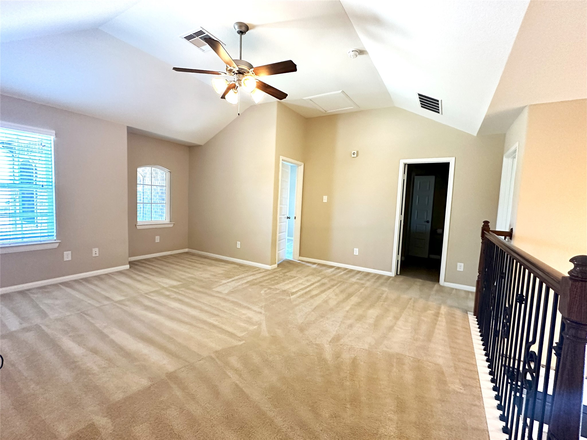 22523 Birch Ridge Meadow Drive Spring, TX 77389 - Photo 22 of 33 a view of an empty room with a chandelier fan