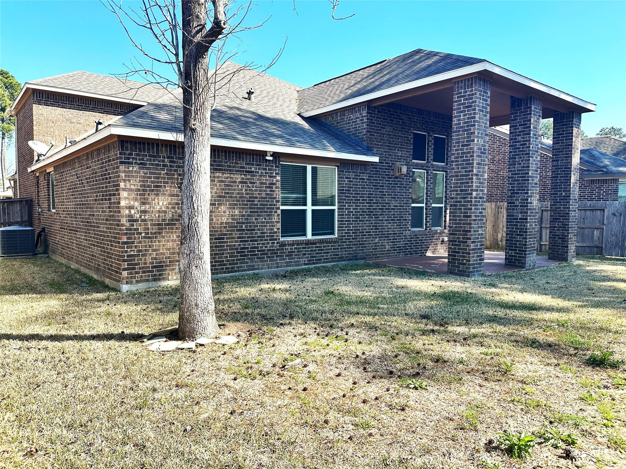 22523 Birch Ridge Meadow Drive Spring, TX 77389 - Photo 33 of 33 a view of a house with a yard