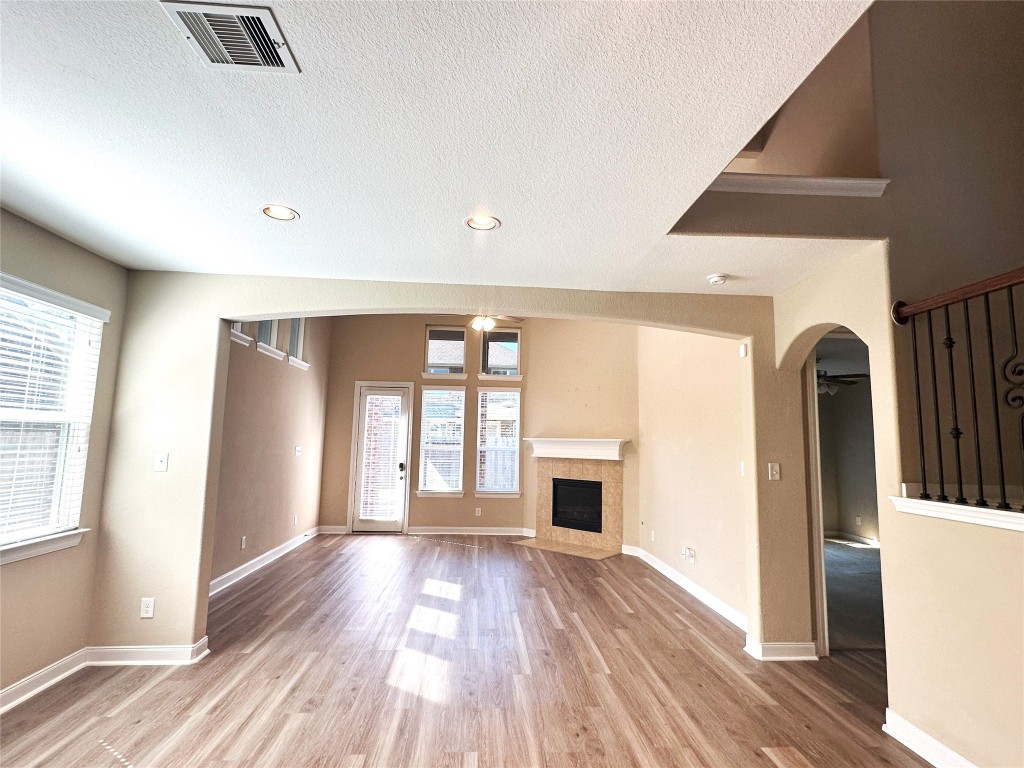 22523 Birch Ridge Meadow Drive Spring, TX 77389 - Photo 8 of 33 a view of empty room with wooden floor and fan