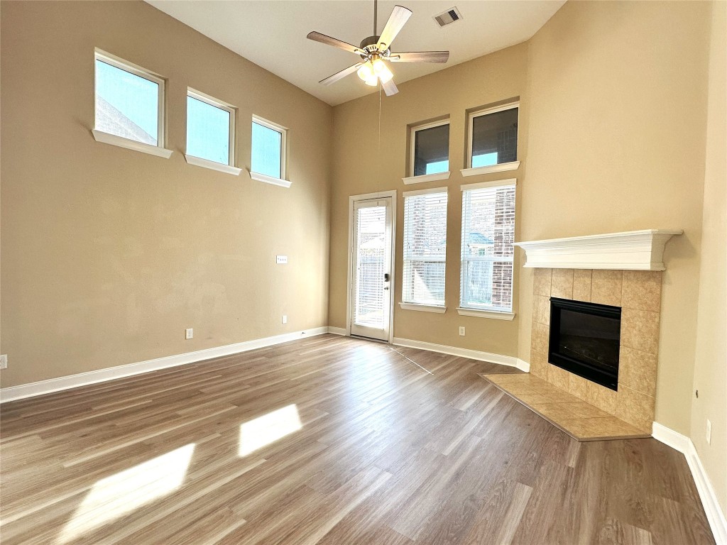 22523 Birch Ridge Meadow Drive Spring, TX 77389 - Photo 10 of 33 a view of an empty room with window and fire place
