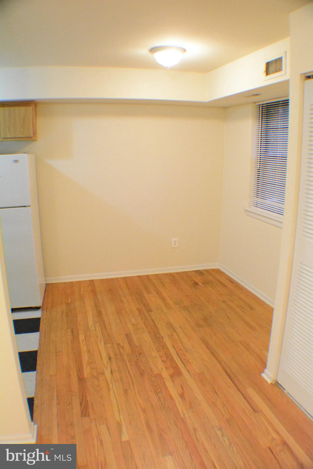 3411 Cresson Street, Unit 4 Philadelphia, PA 19129 - Photo 2 of 16 a view of empty room with wooden floor