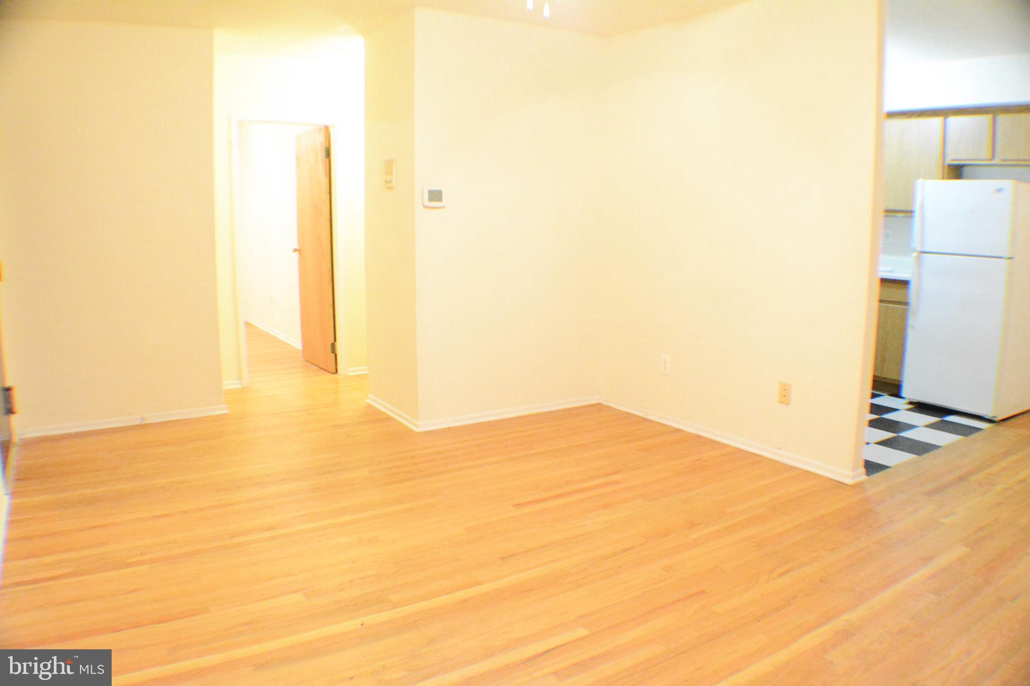 3411 Cresson Street, Unit 4 Philadelphia, PA 19129 - Photo 6 of 16 a view of empty room with wooden floor