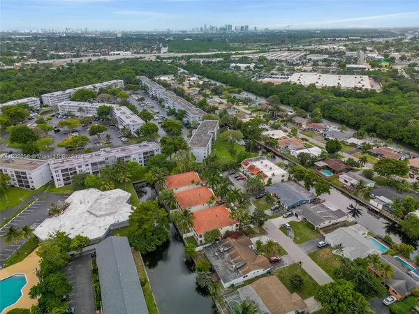 an aerial view of a city with lots of residential buildings