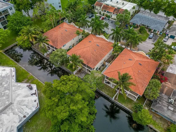 an aerial view of house with yard