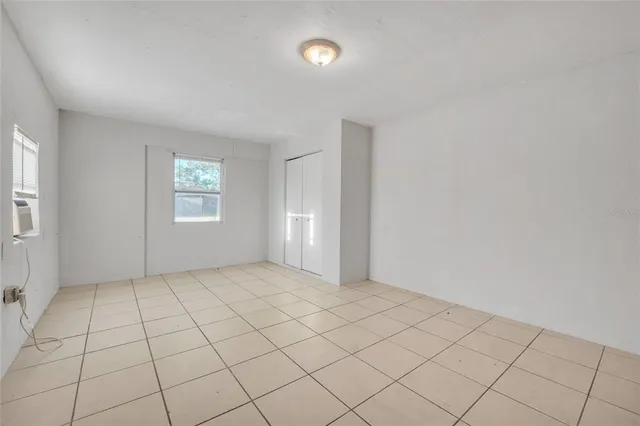 a view of an empty room and window