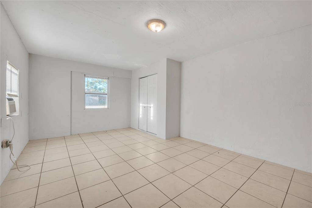 552 Fairmount Road Daytona Beach, FL 32114 - Photo 13 of 13 a view of an empty room and window