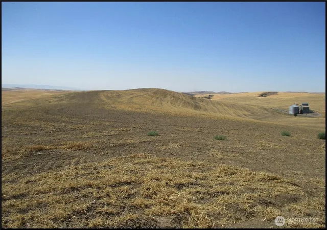 a view of ocean and mountains