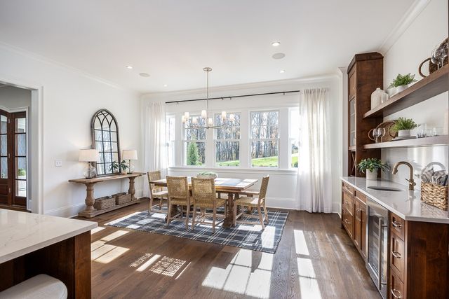 a bed room with a bed and wooden floor