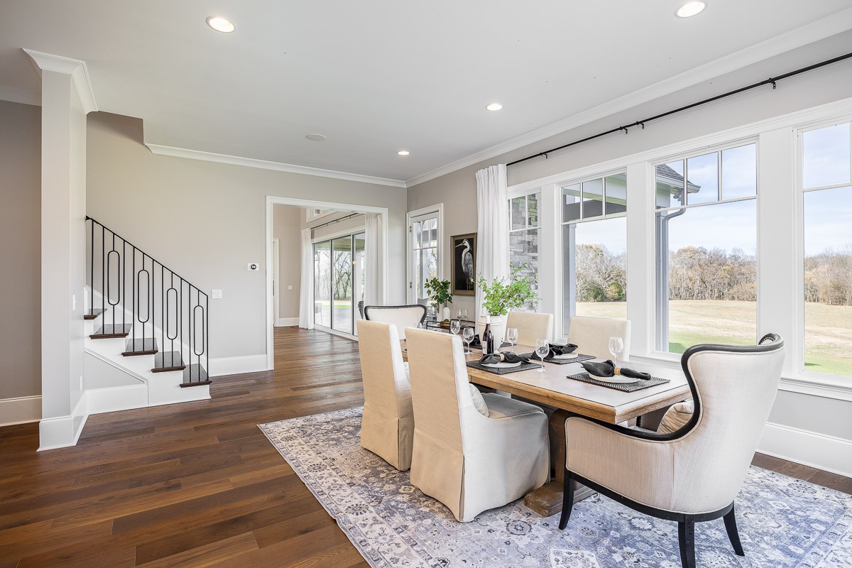 6876 Cross Keys Road College Grove, TN 37046 - Photo 22 of 99 a living room with furniture a table and a large window