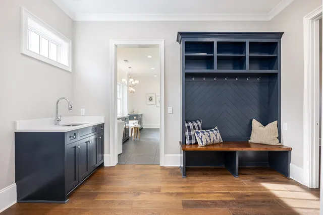a aerial view of a house with a big yard and large trees