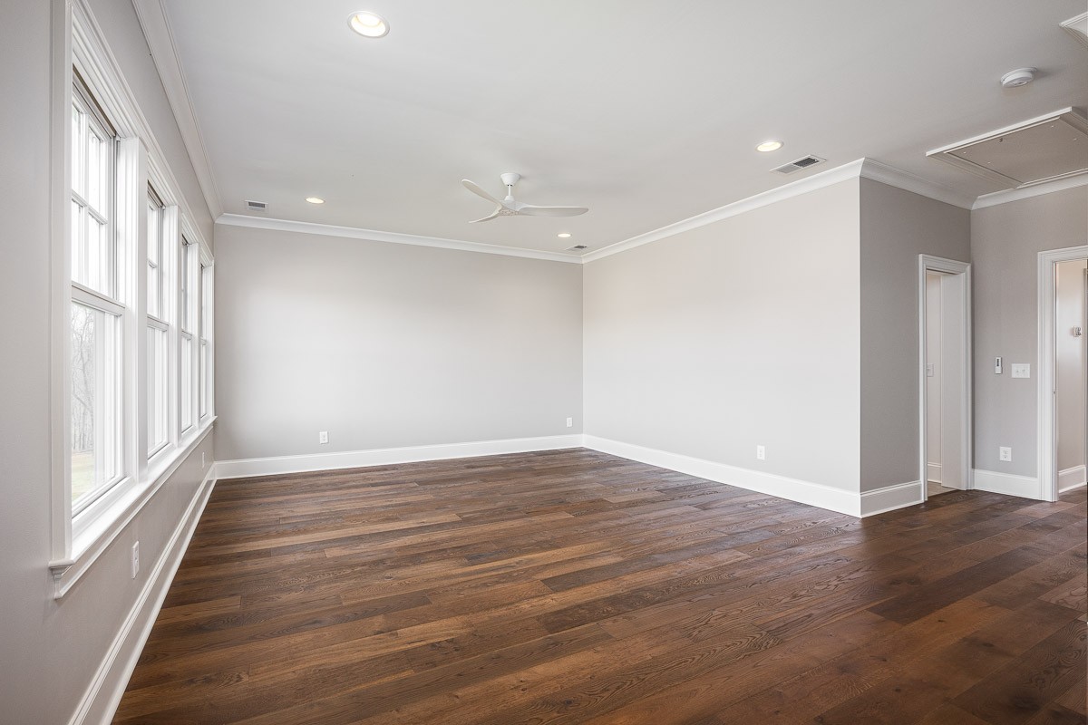 6876 Cross Keys Road College Grove, TN 37046 - Photo 46 of 99 wooden floor in an empty room with a window