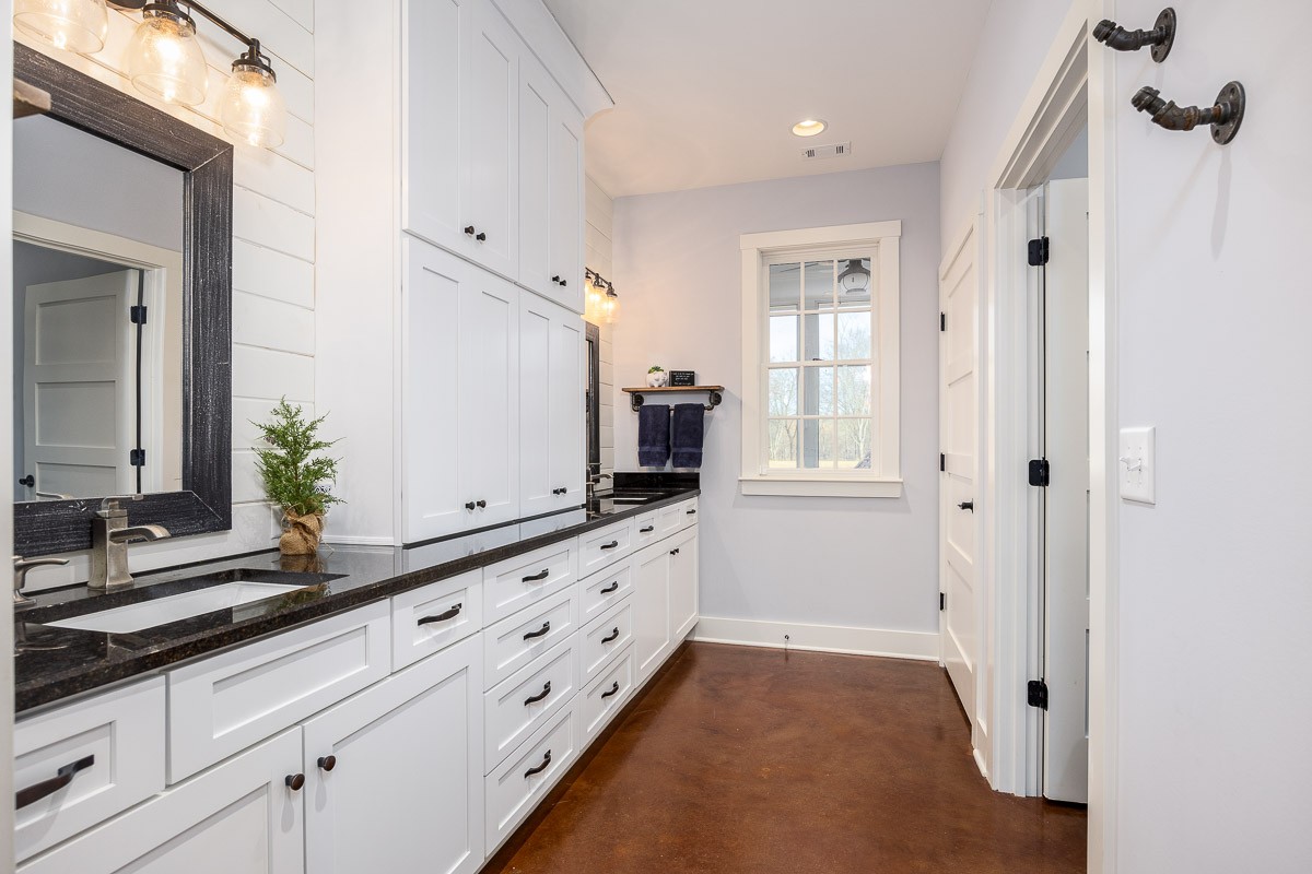 6876 Cross Keys Road College Grove, TN 37046 - Photo 78 of 99 a bathroom with a sink and a mirror