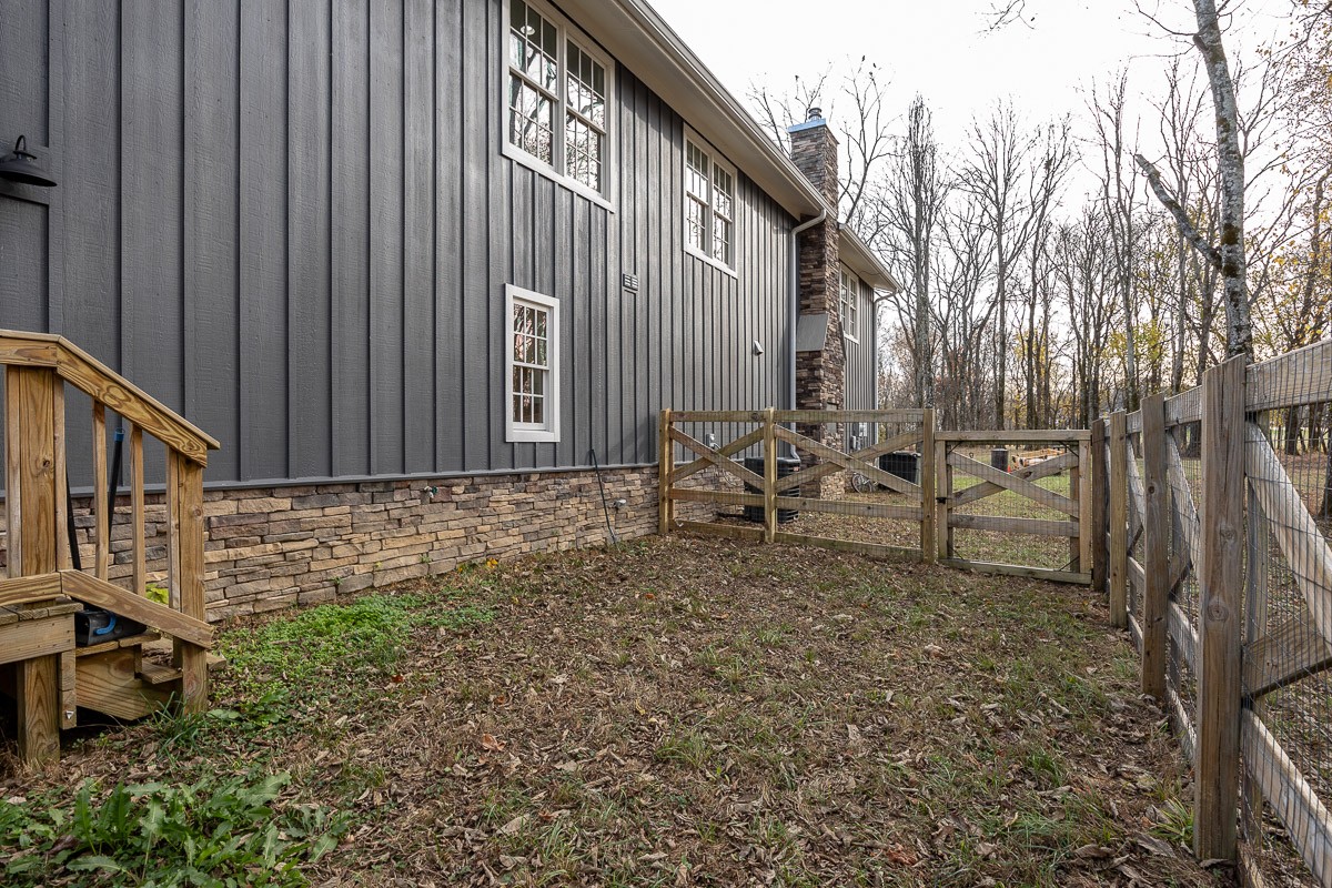 6876 Cross Keys Road College Grove, TN 37046 - Photo 86 of 99 a backyard of a house with table and chairs