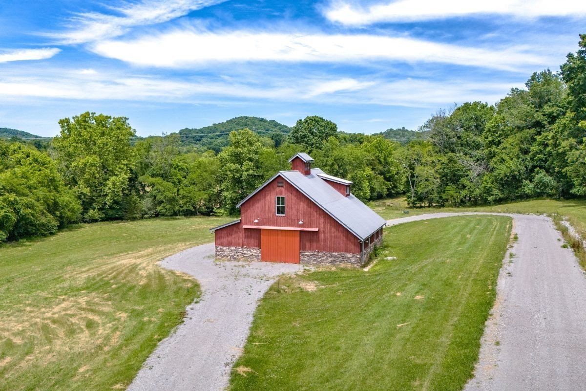 6876 Cross Keys Road College Grove, TN 37046 - Photo 93 of 99 a aerial view of a house next to a yard