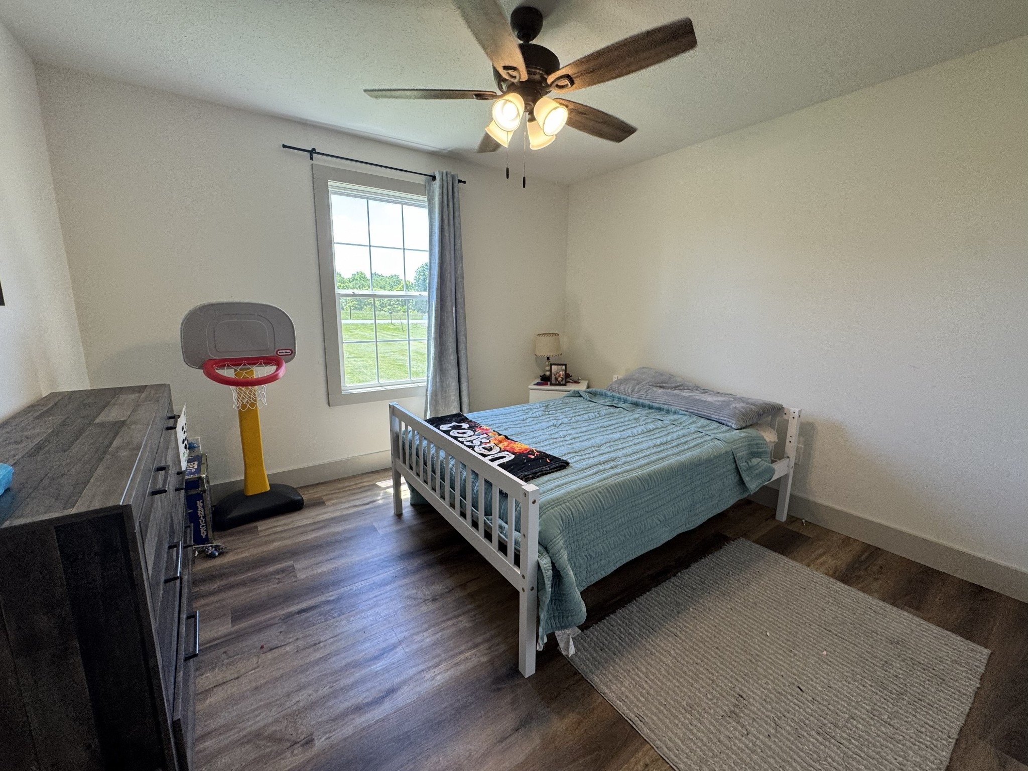 3130 Stokes Chapel Road Elkton, KY 42220 - Photo 10 of 15 a bedroom with a bed and a window