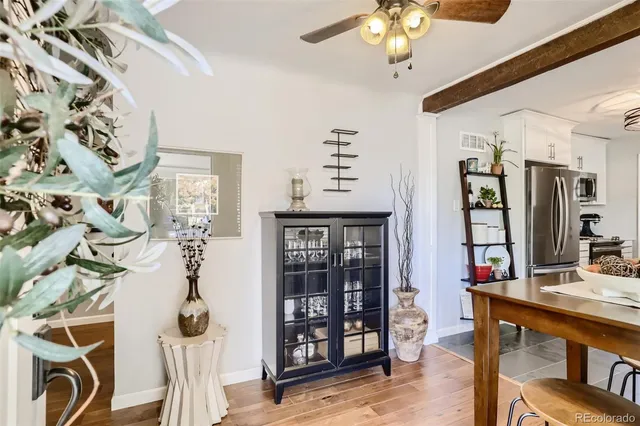 a view of a hallway with workspace and entryway